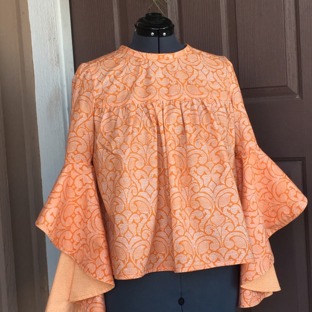 Orange Cream bell sleeve blouse